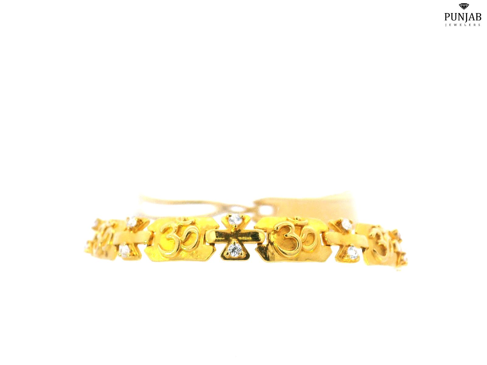 2K Yellow Gold Bracelet with "Om" Symbols and Cubic Zirconia Accents