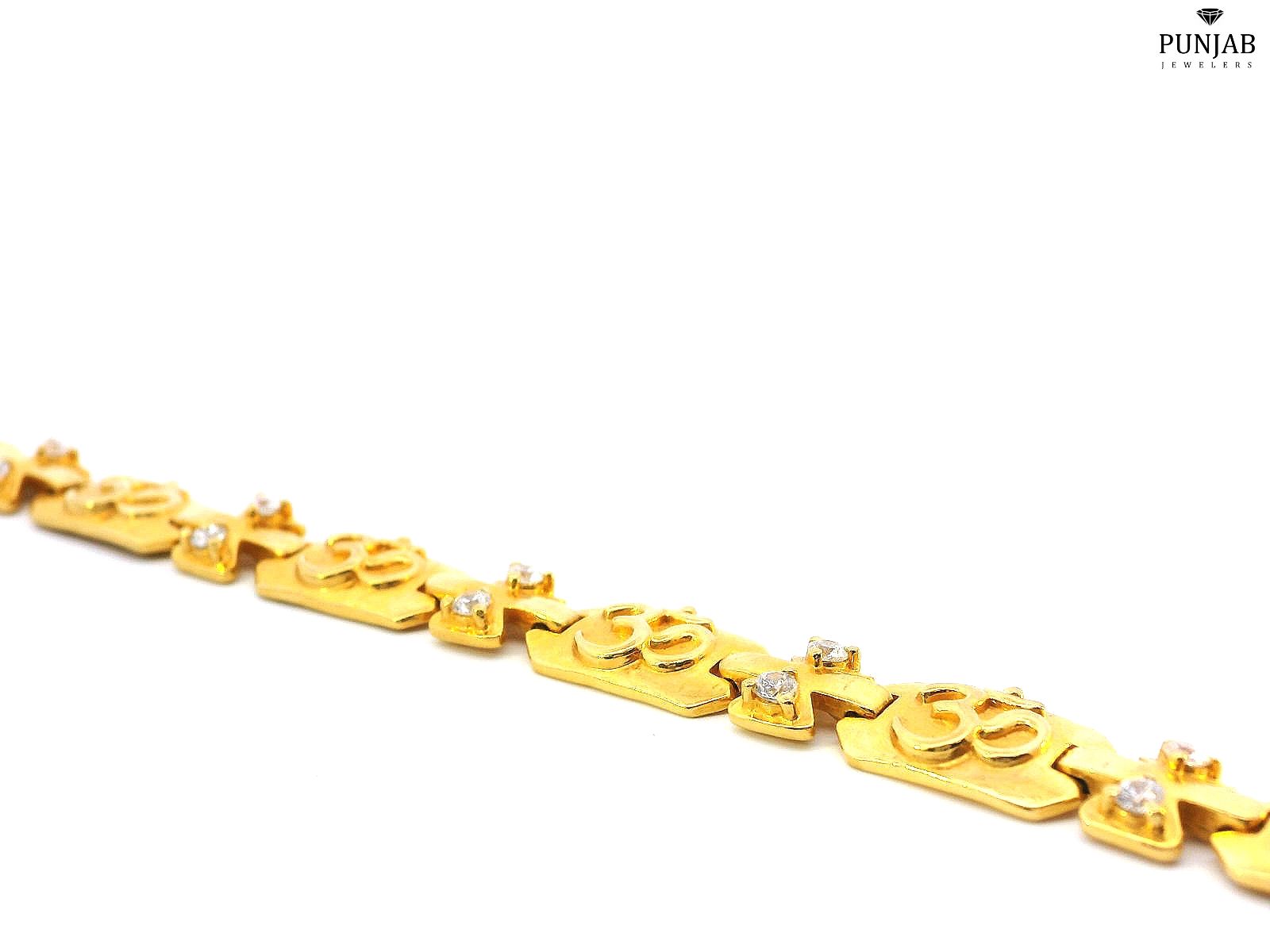 2K Yellow Gold Bracelet with "Om" Symbols and Cubic Zirconia Accents