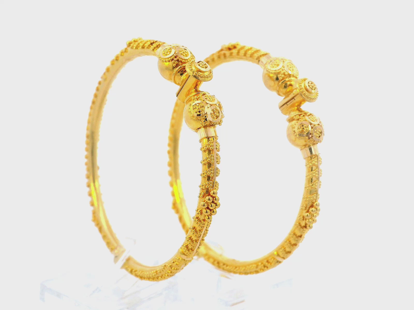 22K Yellow Gold Screw Bangles with Intricate Detailing
