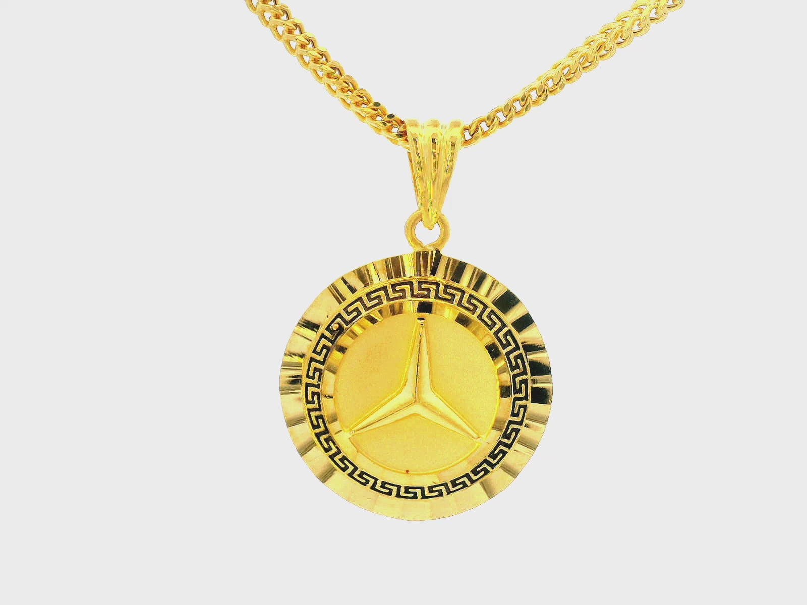 22K Yellow Gold Circular Pendant with Decorative Star Design